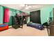 Fun bedroom with a loft bed, desk area, comfortable lower bed and neutral carpeting at 333 Mesa St, Brighton, CO 80601