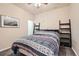 Bedroom with modern artwork, a bed, and decor accents, creating a cozy and stylish space at 333 Mesa St, Brighton, CO 80601