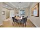Formal dining room with hardwood floors, chandelier, and ample natural light at 27615 E Moraine Dr, Aurora, CO 80016