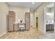 Multi-purpose flex space with built-in desk, cabinets, and access to bathroom and closet at 27615 E Moraine Dr, Aurora, CO 80016