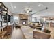 Inviting living room featuring a stone fireplace and hardwood floors at 27615 E Moraine Dr, Aurora, CO 80016