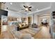 Spacious living room with open floor plan and hardwood floors at 27615 E Moraine Dr, Aurora, CO 80016