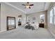 Spacious main bedroom with tray ceiling and a large mirror at 27615 E Moraine Dr, Aurora, CO 80016