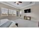 Main bedroom with tray ceilings and a door leading to the outside at 27615 E Moraine Dr, Aurora, CO 80016