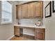 Convenient office nook with built-in cabinets and countertops at 27615 E Moraine Dr, Aurora, CO 80016