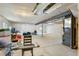 Unfinished basement with concrete flooring and walls ready for your creative ideas and remodeling touch at 23936 E River Front Dr, Aurora, CO 80019