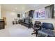 Finished basement featuring ample space, neutral walls, and windows for natural light, perfect for entertainment or storage at 15649 E 7Th Cir, Aurora, CO 80011