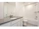 Updated bathroom features a modern vanity, sink, and shower with white subway tile at 585 Twilight St, Erie, CO 80516