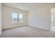 Bedroom with carpet and natural lighting featuring mountain views at 1785 Grayside Cir, Castle Rock, CO 80109