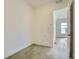 Empty bedroom with modern hardwood floors, white trim, and minimalist design at 1785 Grayside Cir, Castle Rock, CO 80109