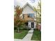 Charming two-story home with modern design, lush lawn, and tasteful landscaping at 3422 S Grant St, Englewood, CO 80113
