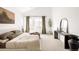 Serene main bedroom with neutral tones, vaulted ceiling, and a large window at 3422 S Grant St, Englewood, CO 80113