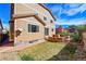Backyard featuring a stone patio and a small grass yard and privacy from neighbors with the fence at 12762 Fisher St, Englewood, CO 80112