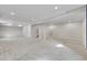 Expansive basement featuring neutral carpeting, recessed lights, and crisp white trim and paint at 12762 Fisher St, Englewood, CO 80112