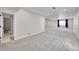 Spacious finished basement with neutral carpet, white walls, recessed lighting, and bright, natural light at 12762 Fisher St, Englewood, CO 80112