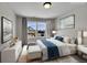Bright bedroom with large windows, offering a view of the neighborhood at 12762 Fisher St, Englewood, CO 80112