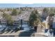 Aerial view of condo building with parking and landscaping at 8600 E Alameda Ave # 13-108, Denver, CO 80247
