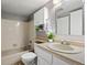 Clean bathroom with a shower/tub combo, vanity, and updated fixtures at 8600 E Alameda Ave # 13-108, Denver, CO 80247