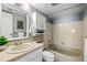 Clean bathroom with a tub, shower, and updated vanity at 8600 E Alameda Ave # 13-108, Denver, CO 80247