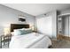 Main bedroom with sliding glass door to a private balcony at 8600 E Alameda Ave # 13-108, Denver, CO 80247