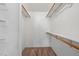 Walk-in closet with double hanging rods and shelving at 8600 E Alameda Ave # 13-108, Denver, CO 80247
