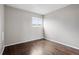 Unfurnished bedroom with dark wood floors at 2113 Coronado Pkwy # B, Denver, CO 80229