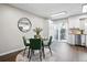 Bright kitchen nook with modern decor and stylish dining set at 2113 Coronado Pkwy # B, Denver, CO 80229