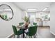 Bright kitchen nook with modern decor and stylish dining set at 2113 Coronado Pkwy # B, Denver, CO 80229