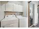 Bright laundry room with washer and dryer at 2113 Coronado Pkwy # B, Denver, CO 80229