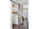 Bright laundry room with barn door at 2113 Coronado Pkwy # B, Denver, CO 80229