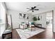 Inviting living room with neutral walls, contemporary furnishings, and plenty of natural light at 2113 Coronado Pkwy # B, Denver, CO 80229