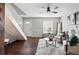 Welcoming living room featuring comfortable seating, stylish decor, and a ceiling fan at 2113 Coronado Pkwy # B, Denver, CO 80229