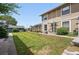 Spacious front yard with well-maintained lawn and landscaping at 2113 Coronado Pkwy # B, Denver, CO 80229