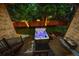 Beautiful backyard with manicured lawn, deck, and patio featuring a hot tub, perfect for relaxing at 10601 E Crestline Ave, Englewood, CO 80111