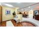 Inviting basement entry with tiled flooring, leading to open dining area at 10601 E Crestline Ave, Englewood, CO 80111