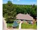 Beautiful home with mature trees and well-maintained landscaping at 10601 E Crestline Ave, Englewood, CO 80111