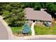 Beautiful home with mature trees and well-maintained landscaping at 10601 E Crestline Ave, Englewood, CO 80111