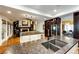Bright kitchen with large island, stainless appliances, and open floor plan at 10601 E Crestline Ave, Englewood, CO 80111