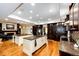 Open-concept kitchen with dual islands, granite countertops, and ample storage at 10601 E Crestline Ave, Englewood, CO 80111