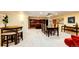 Basement area with bar and dining space, great for entertaining guests at 10601 E Crestline Ave, Englewood, CO 80111