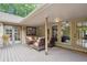 Relaxing covered patio with comfortable seating and outdoor decor at 10601 E Crestline Ave, Englewood, CO 80111