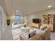 Basement living room with comfortable seating, recessed lighting, and a neutral color scheme at 3209 N Olive St, Denver, CO 80207