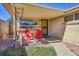 Inviting front porch with seating area and well-maintained facade at 3209 N Olive St, Denver, CO 80207