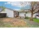 Spacious backyard featuring a wood-chip ground cover and a comfortable seating area at 18830 E 16Th Pl, Aurora, CO 80011
