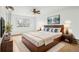 Serene bedroom with a ceiling fan and neutral decor at 18830 E 16Th Pl, Aurora, CO 80011