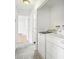 Bright laundry room with modern washer and dryer units at 18830 E 16Th Pl, Aurora, CO 80011