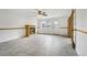 Spacious living room boasting tile flooring, a fireplace, and glass paneled doors at 18830 E 16Th Pl, Aurora, CO 80011