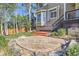 Inviting backyard patio with landscaping and a small deck, perfect for outdoor entertaining at 3080 Madison Ln, Broomfield, CO 80023