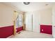 Bedroom featuring a large closet and a nice window that offers an abundance of natural light at 3080 Madison Ln, Broomfield, CO 80023