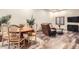 Open dining area with hardwood floors and a dining table with chairs at 3080 Madison Ln, Broomfield, CO 80023